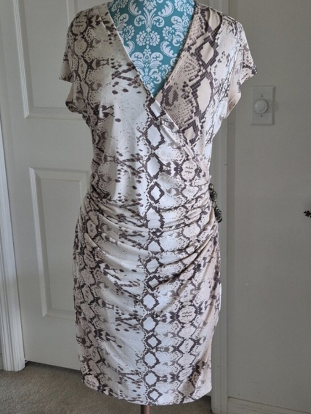 Jennifer Lopez Cream and Brown Snake Print Wrap Dress
